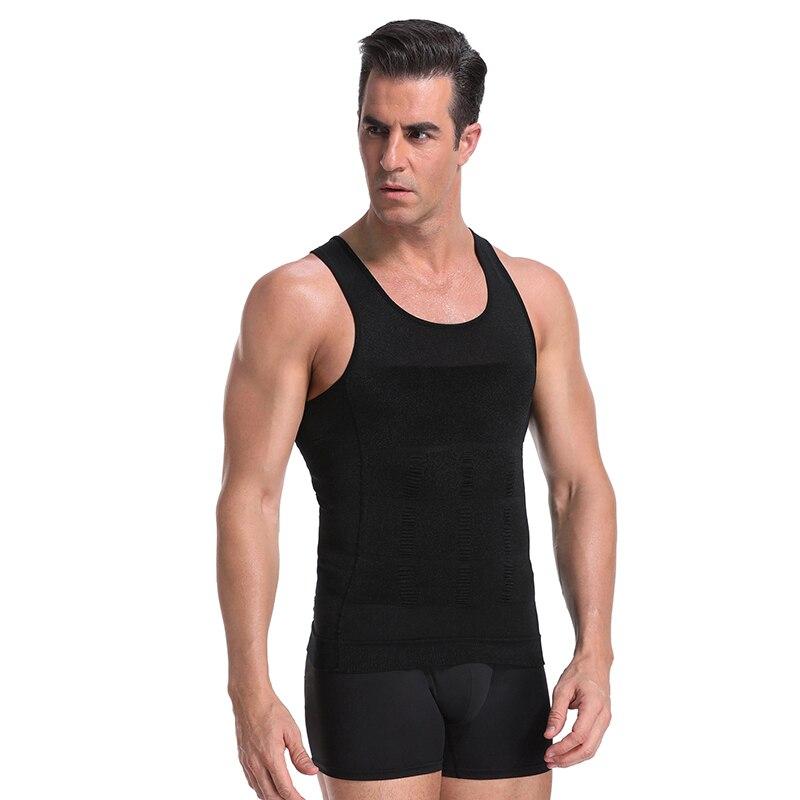 Men's compression tank undershirt, black sleeveless; front view on model