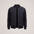 Men's black quilted puffer jacket with high collar and full-zip front
