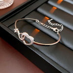 Novara | Infinity Heart Bracelet for Women - Crystal Interlocking Elegant Fit-bracelet-Gold-Camoufit