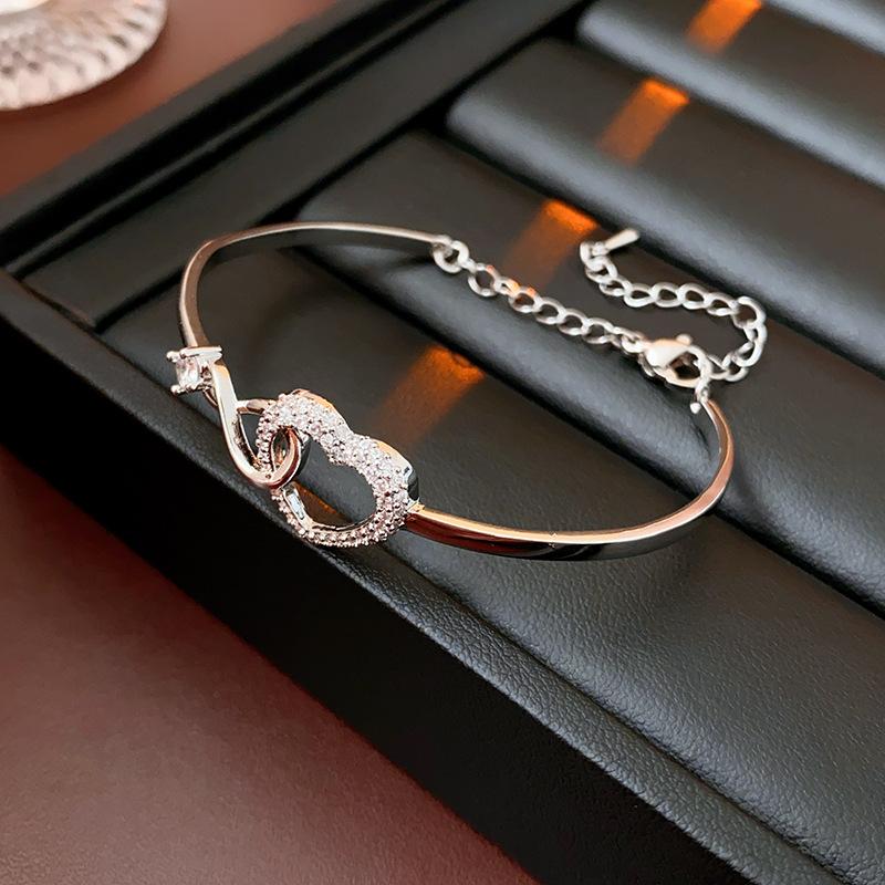 Novara | Infinity Heart Bracelet for Women - Crystal Interlocking Elegant Fit-bracelet-Gold-Camoufit