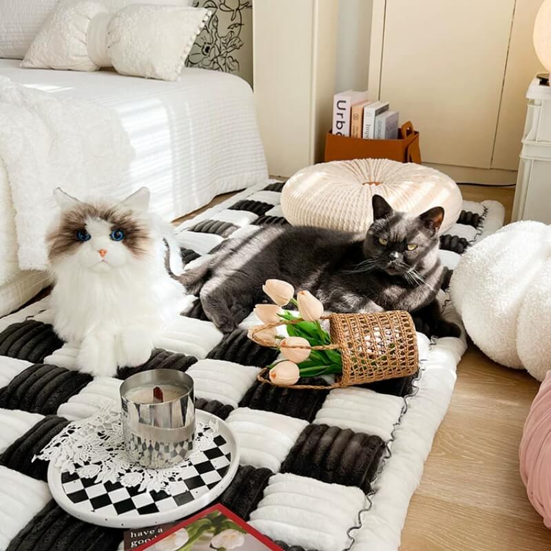 Chenille pet blanket couch cover with black-and-white striped quilted surface