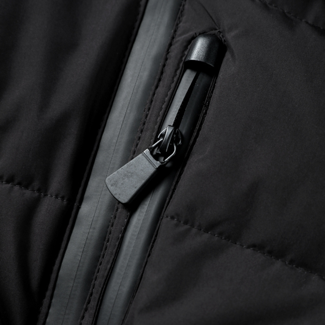 Black puffer jacket front zipper with glossy pull tab