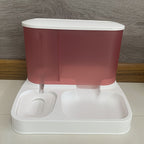 2-in-1 pet feeder and water dispenser, pink top with white base and two molded bowls.