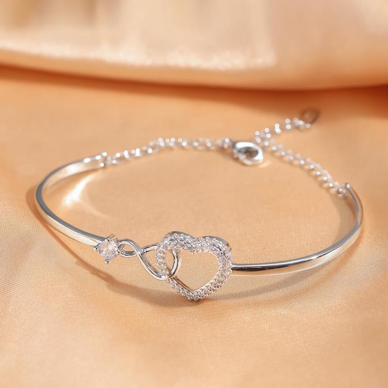 Novara | Infinity Heart Bracelet for Women - Crystal Interlocking Elegant Fit-bracelet-Gold-Camoufit
