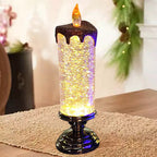 Gold glitter candle-style LED Christmas light with flame top and dark base