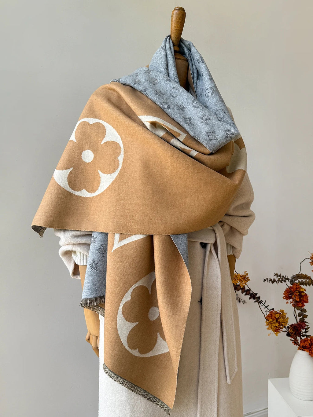 Oversized jacquard scarf in camel and blue-gray with large flower pattern and fringed edges