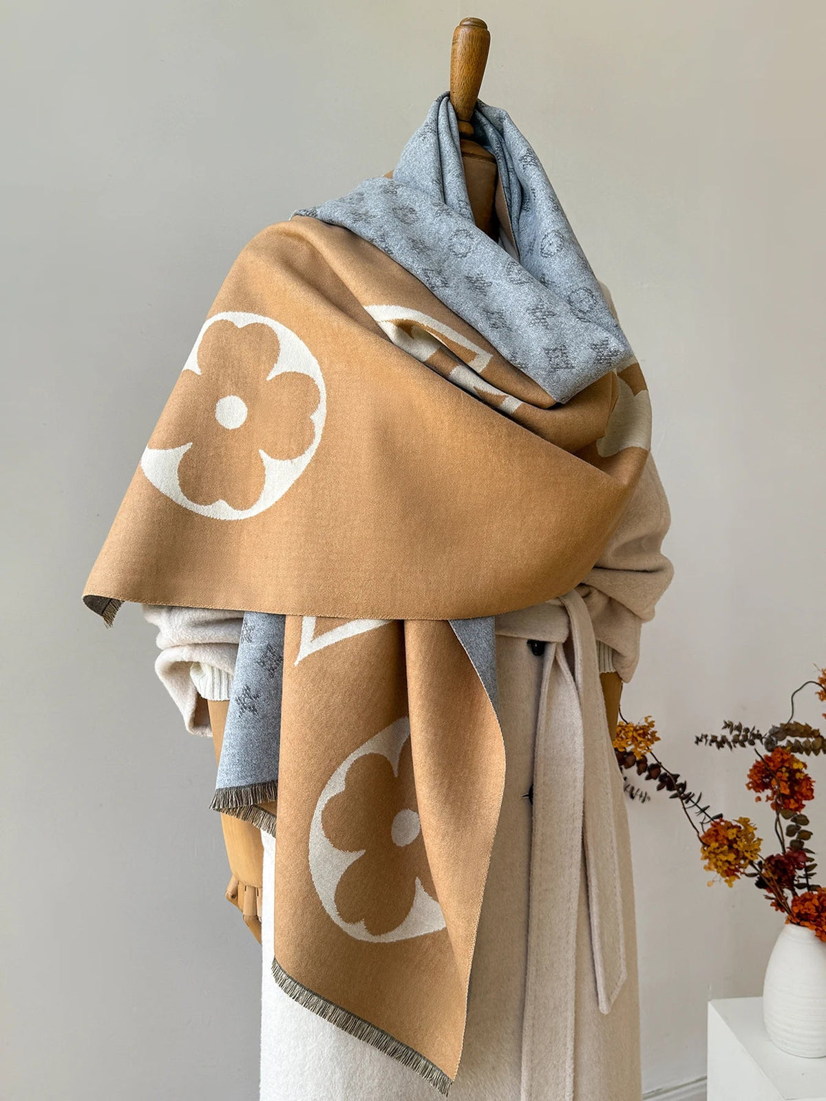 Oversized jacquard scarf in camel and blue-gray with large flower pattern and fringed edges
