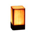 Square wood-look LED night light with warm glow through a textured lamp panel
