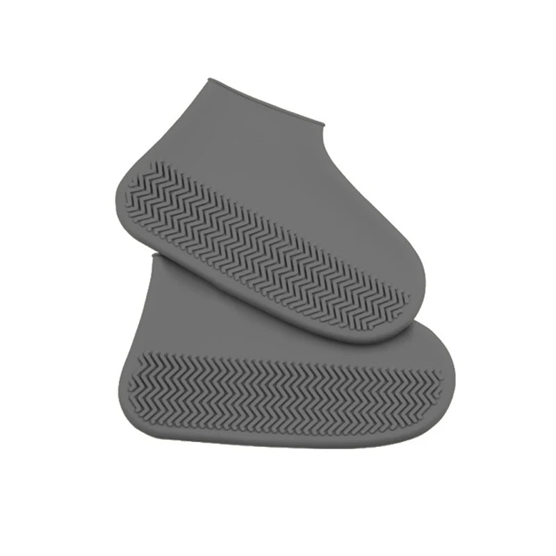 Reusable gray waterproof shoe covers with elastic cuff and textured sole tread