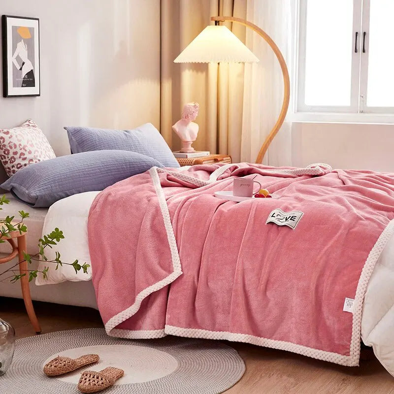 Pink plush flannel fleece throw blanket with white scalloped trim and LOVE patch