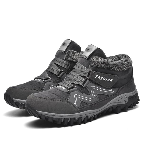 Gray winter boots with faux fur collar, hook-and-loop straps, deep lug traction sole