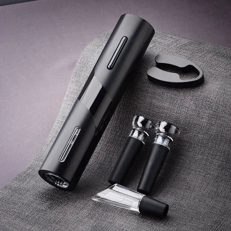 Compact electric wine opener with black charging stand and two wine accessory pieces