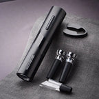 Compact electric wine opener with black charging stand and two wine accessory pieces