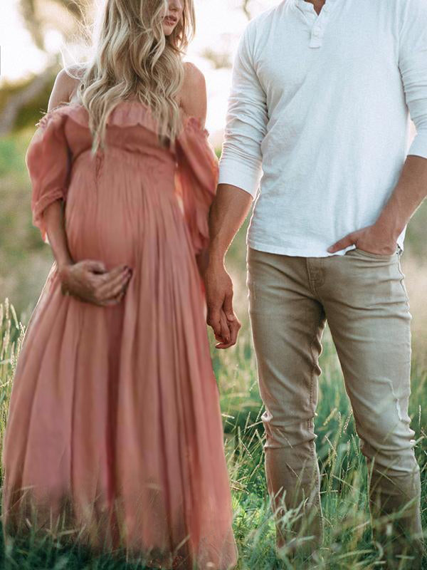 Pink off-shoulder maternity dress with smocked bodice and flowing full skirt