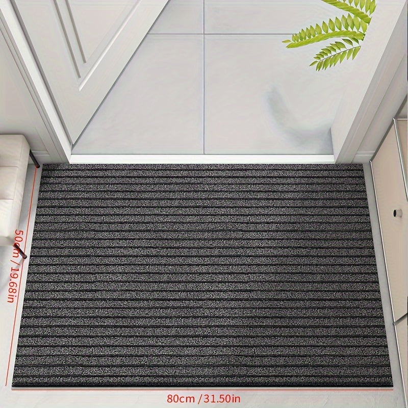 Gray low-profile entry doormat with dense ribbed stripe surface and border