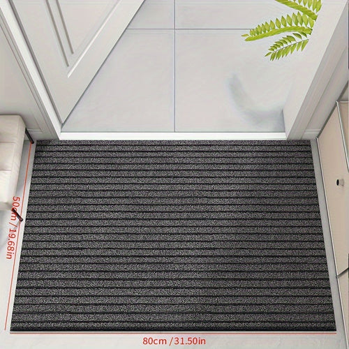 Gray low-profile entry doormat with dense ribbed stripe surface and border