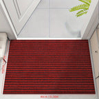 Red low-profile entry doormat with dense ribbed stripe surface and border