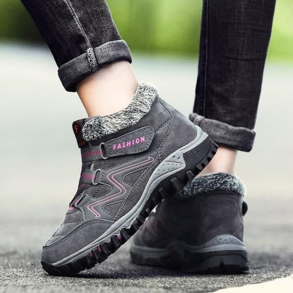Gray winter boots with faux fur collar, padded details, hook-and-loop straps and tread