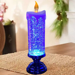 Blue glitter candle-style LED Christmas light with flame top and blue base