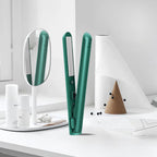Mini 2-in-1 travel curling and straightening iron with teal/green plates