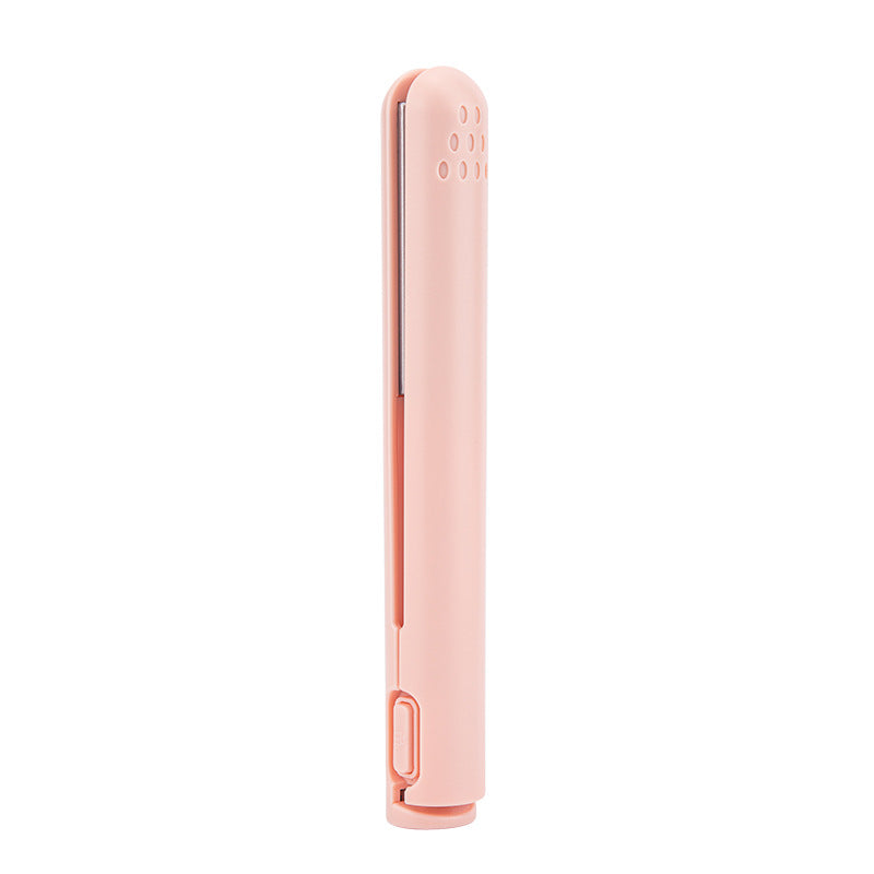 Mini 2-in-1 travel curling and straightening iron, light pink body with side switch