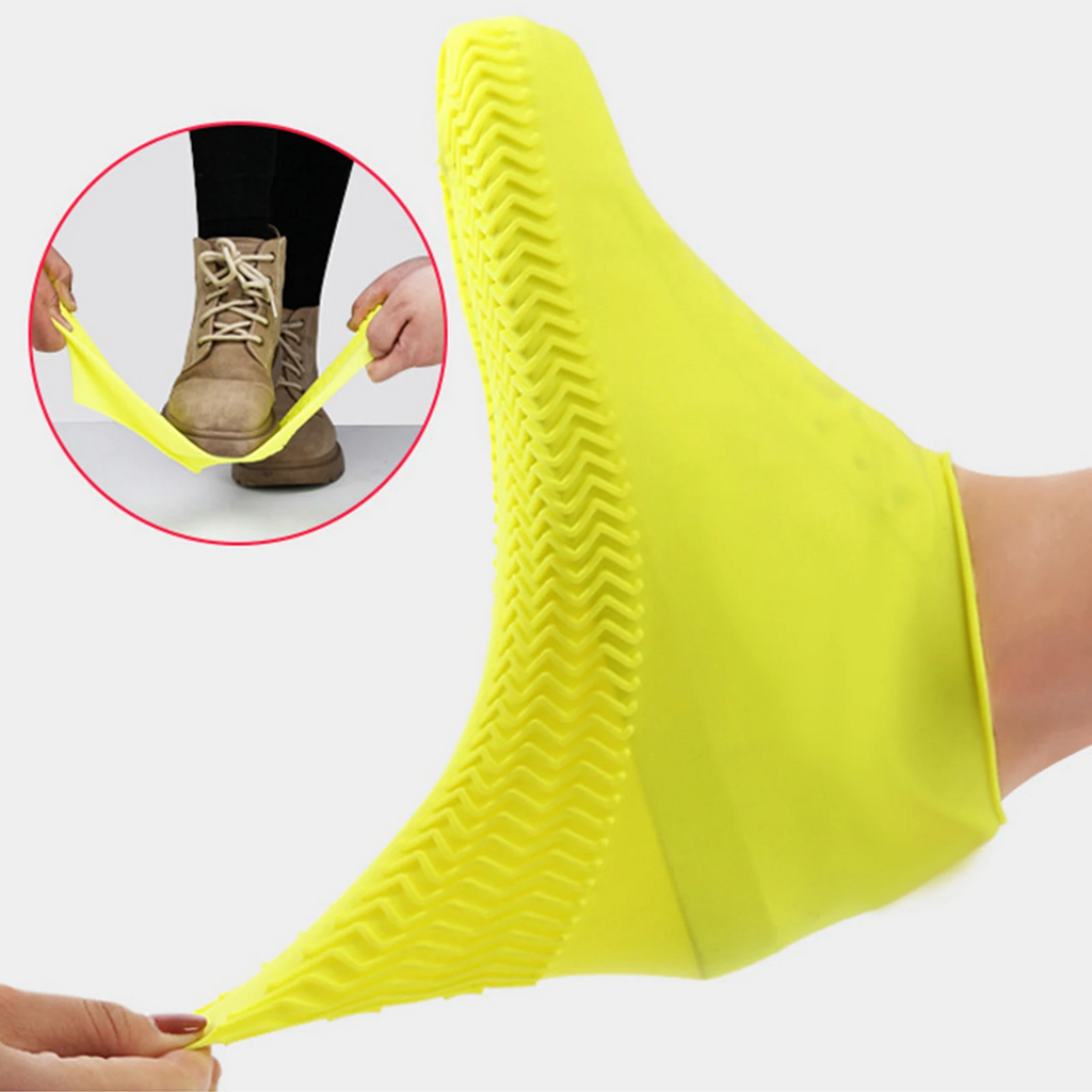Yellow reusable waterproof shoe cover with elastic cuff and textured zigzag tread
