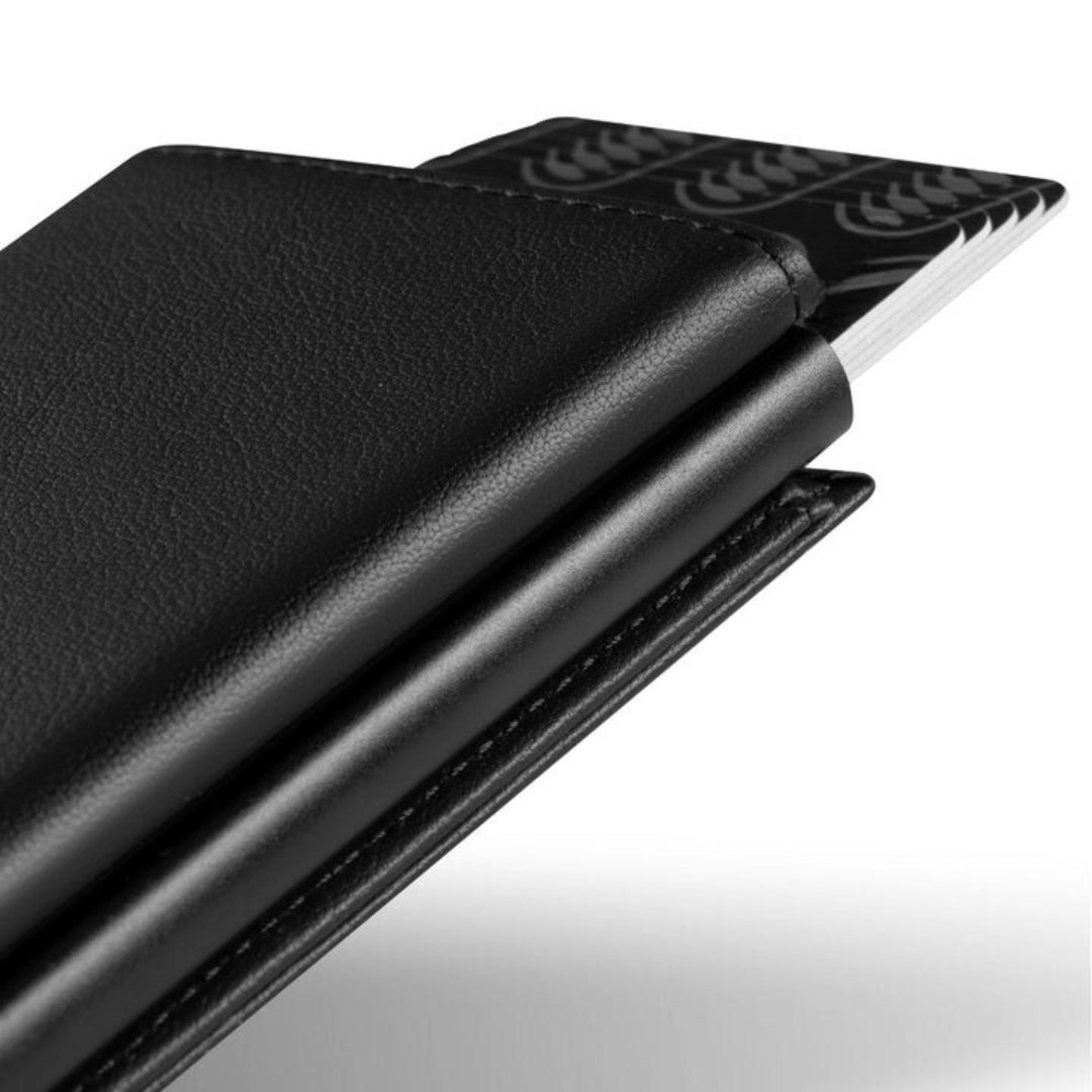 Close-up side view of black wallet with pop-up push rail and card insert slot