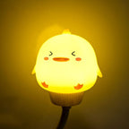 Silicone chick-shaped night light with soft cup and warm glow
