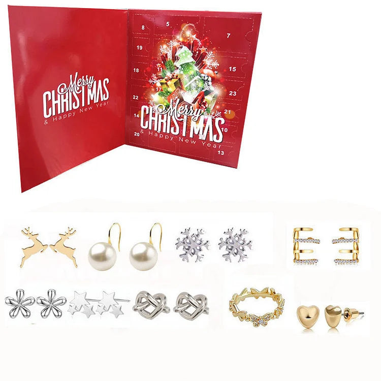 Jewelry advent calendar open with numbered windows and assorted gold-tone accessories