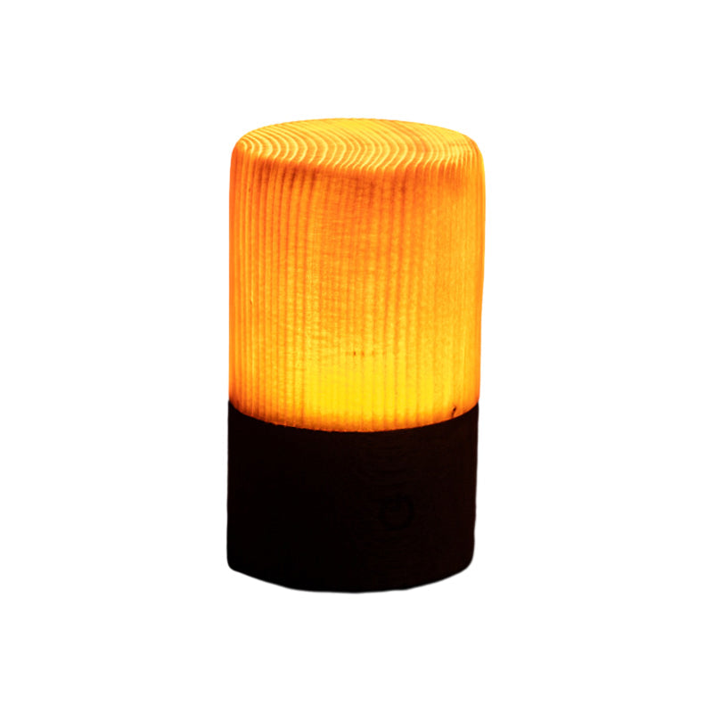 Cylinder wood-look LED night light with warm glow and dark base