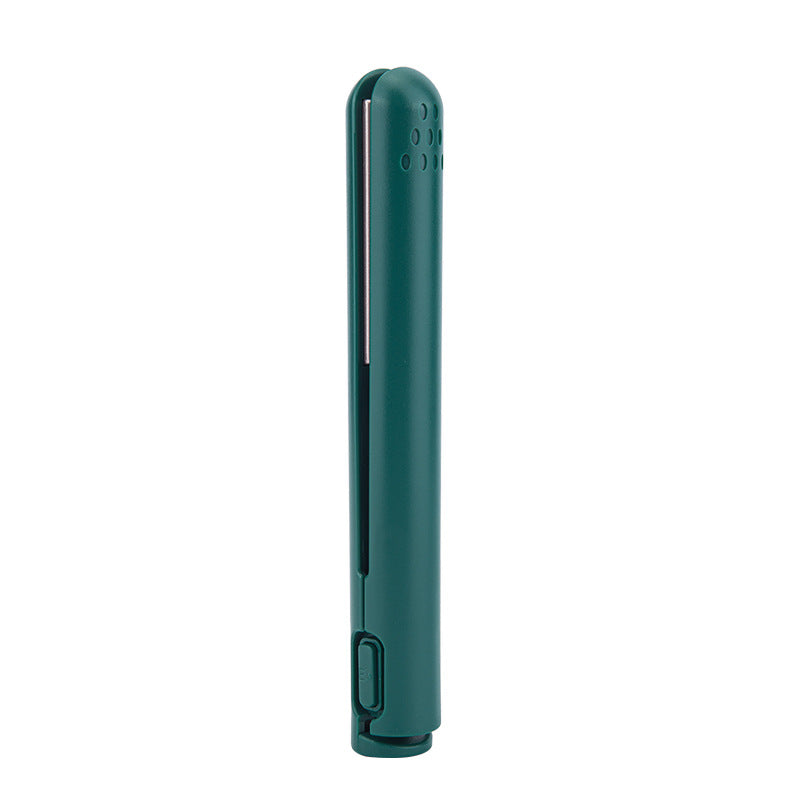 Mini 2-in-1 travel curling and straightening iron, dark green body with side switch