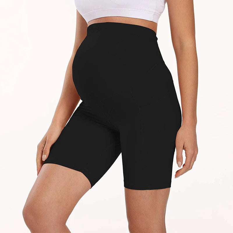 Black maternity bike-length leggings with high waist panel and stitched seam detail