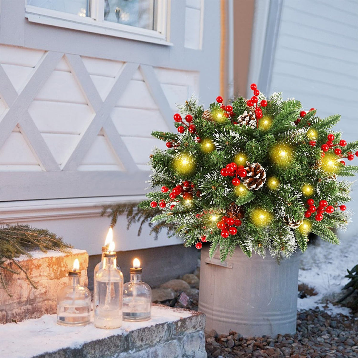 Lighted Christmas wreath planter insert with green pine, red berries, and warm yellow LEDs