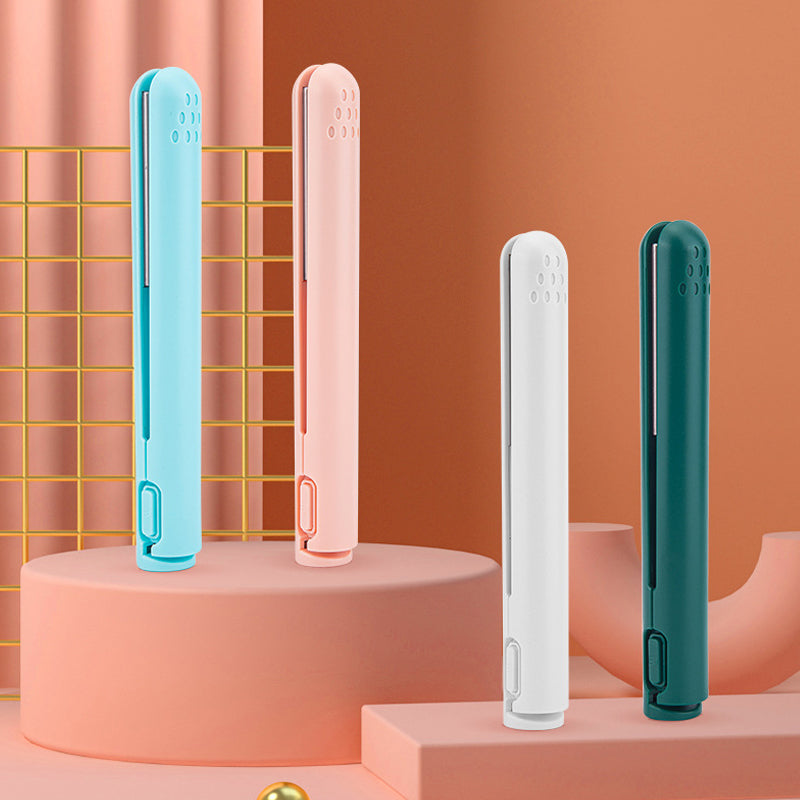 Mini 2-in-1 travel curling and straightening irons in blue, pink, white, and teal.