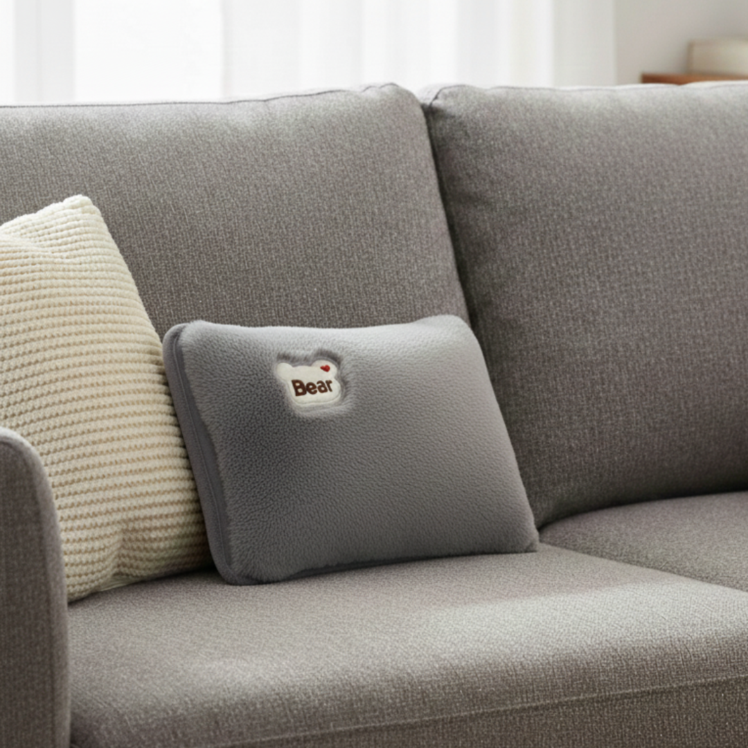 Rechargeable hot water heating pad with gray fleece cover and Bear patch