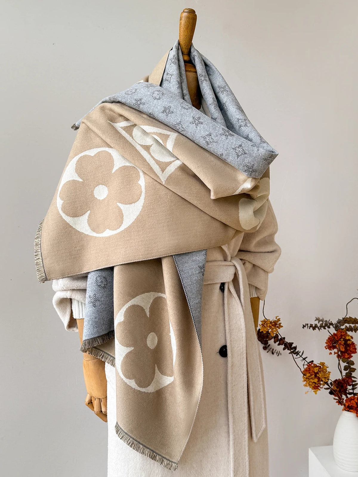 Oversized jacquard scarf in tan, beige, and blue-gray with large flower motif and fringes