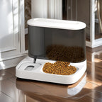 2-in-1 pet feeder and water dispenser, white base with dark bowls and top reservoir.