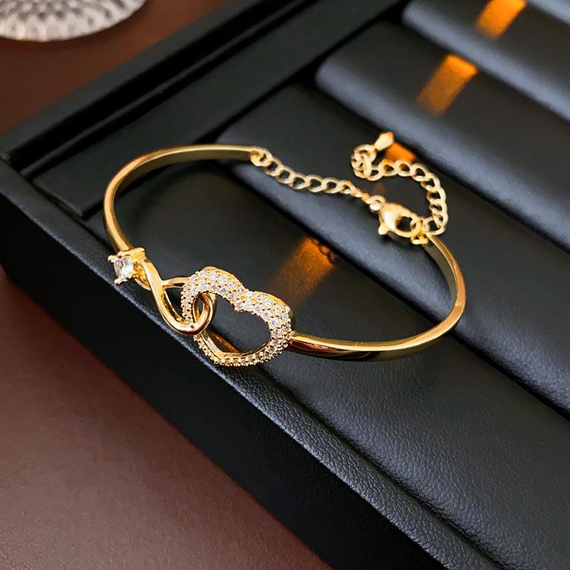 Novara | Infinity Heart Bracelet for Women - Crystal Interlocking Elegant Fit-bracelet-Gold-Camoufit
