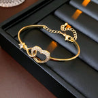 Novara | Infinity Heart Bracelet for Women - Crystal Interlocking Elegant Fit-bracelet-Gold-Camoufit
