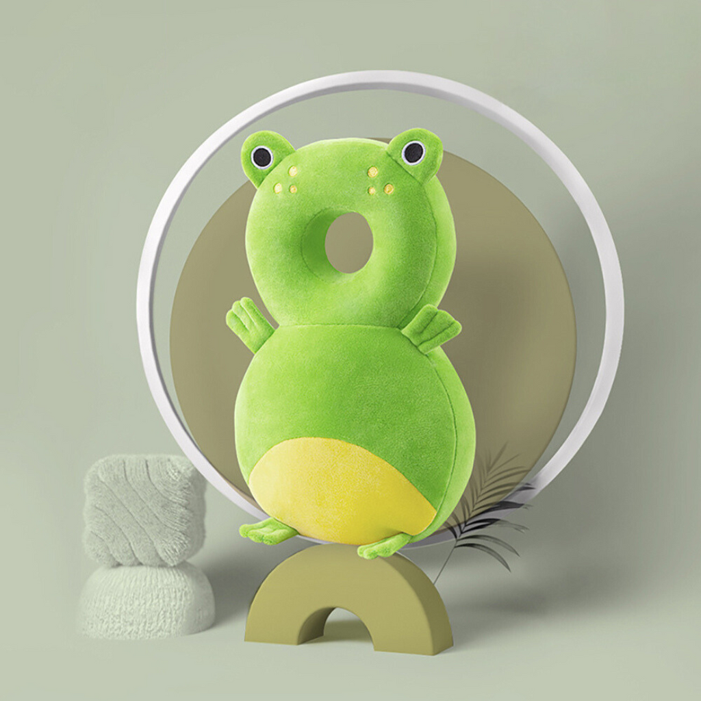 Green frog-shaped padded head protector backpack with yellow belly