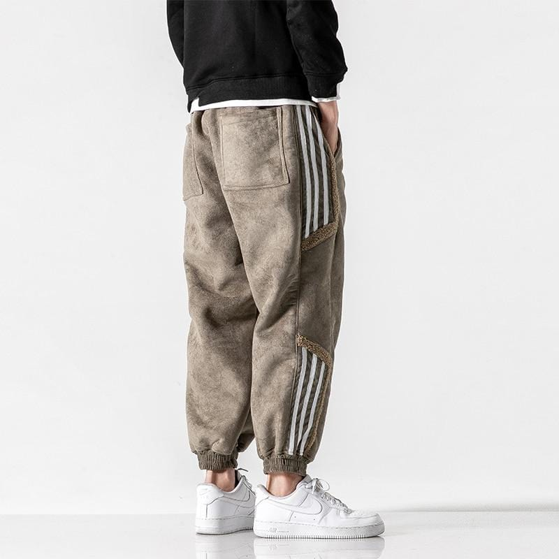 Sherpa-lined brown jogger sweatpants, back view, with white side stripes and pockets