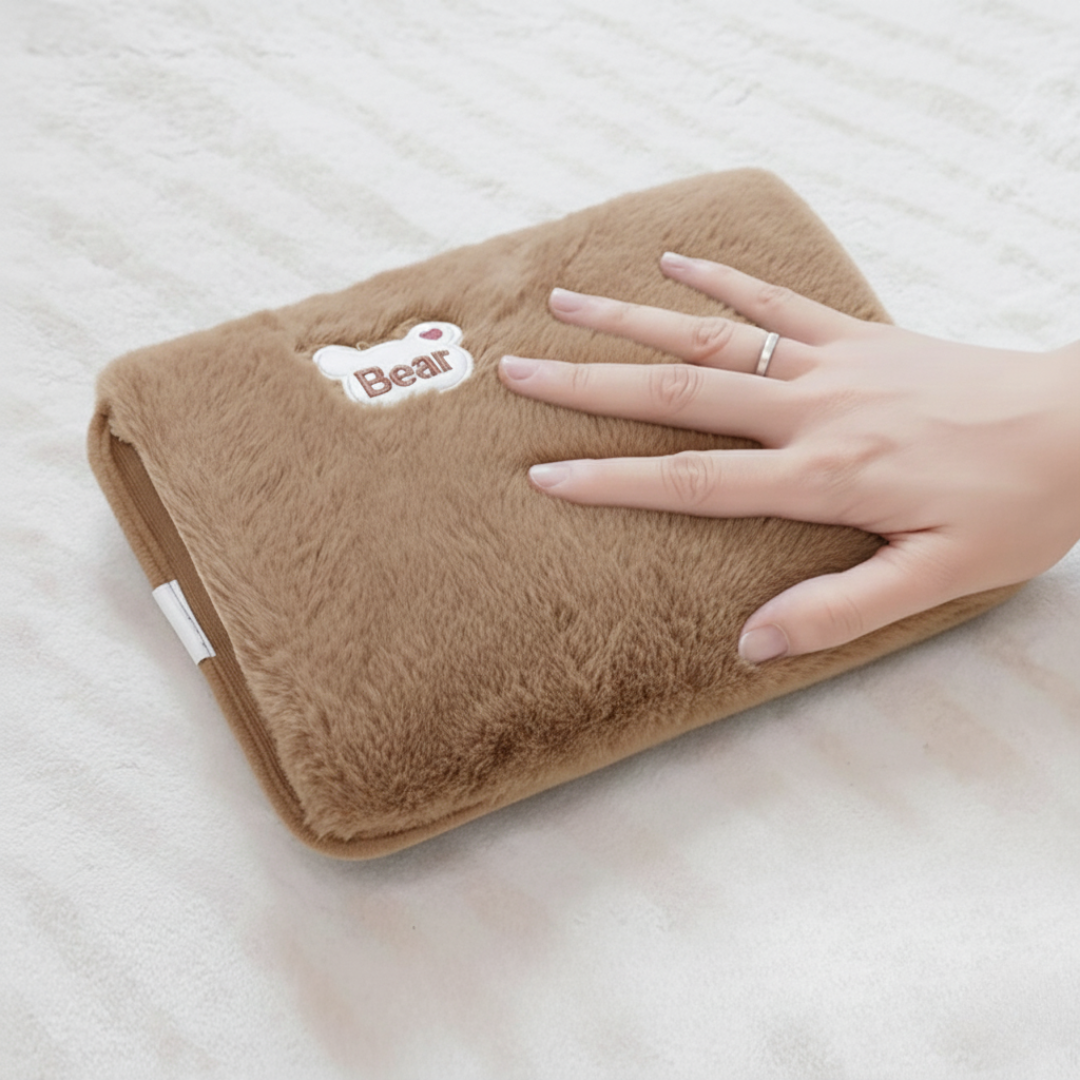 Rechargeable hot water heating pad with tan fleece cover and Bear patch