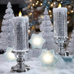 Pair of white glitter LED candle lights with flame tops and silver bases