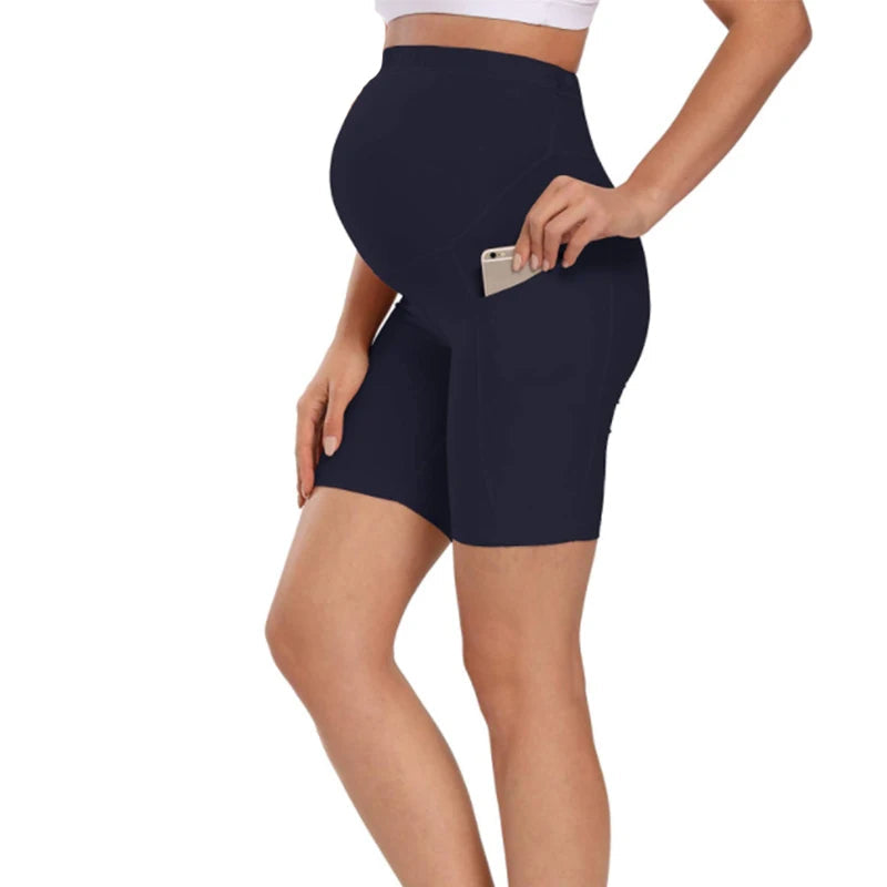 Navy maternity bike-length leggings with high waist and back pocket detail