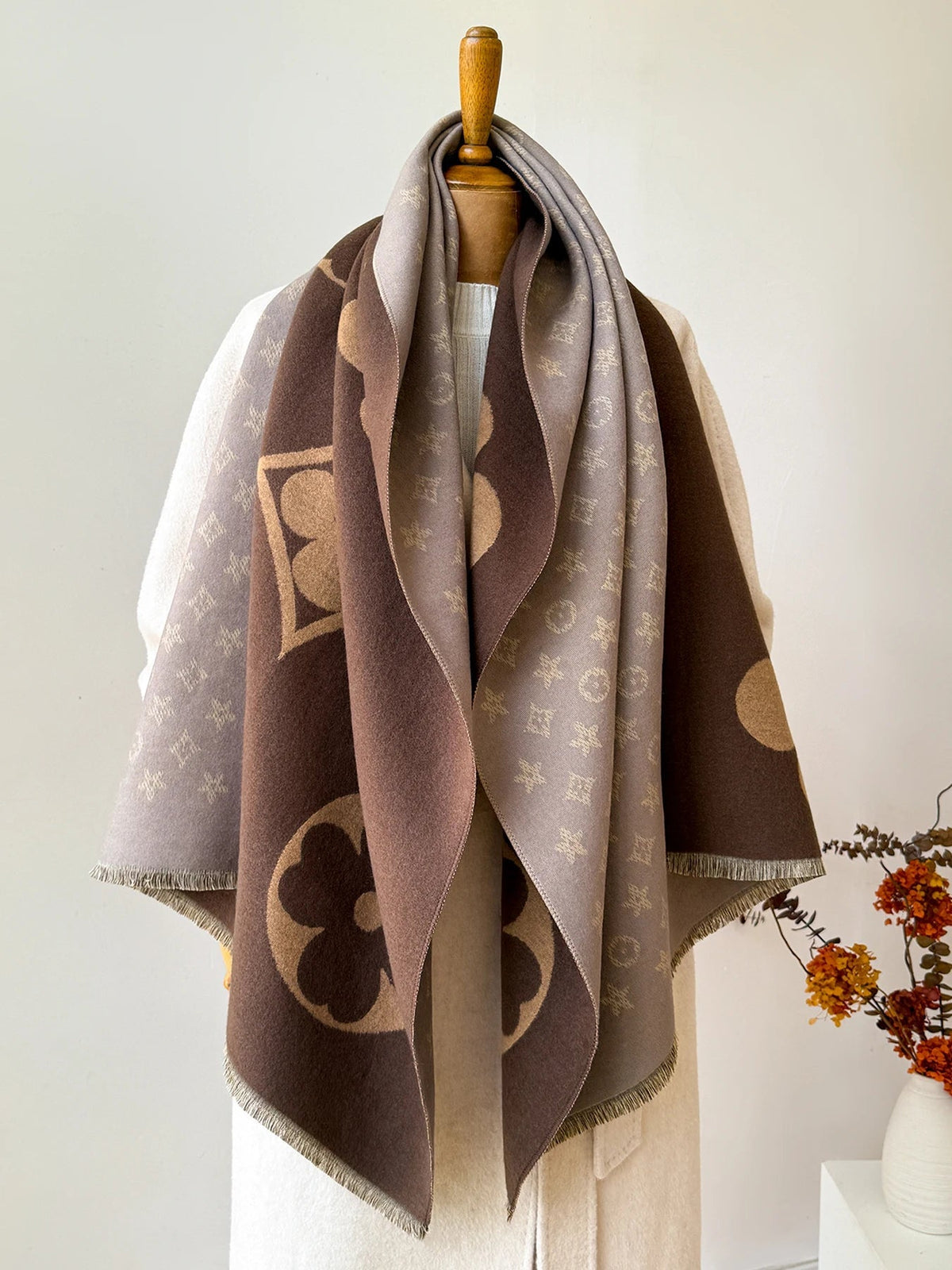 Oversized jacquard scarf in taupe, beige, and light gray with large flower motifs
