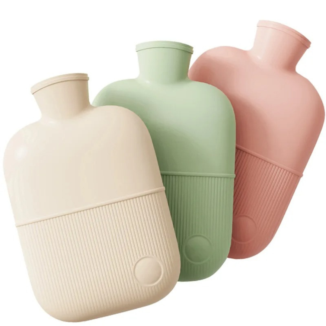 Three large hot water bottles in natural beige, green, and pink colors