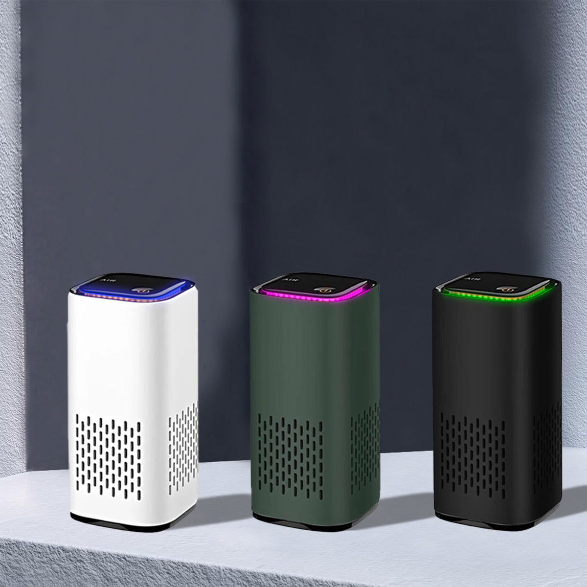 Air purifier set with white, green, and black bodies and LED-lit top panels