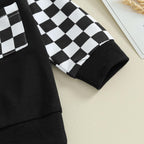Black sweatshirt with checkered sleeve cuff and ribbed knit hem