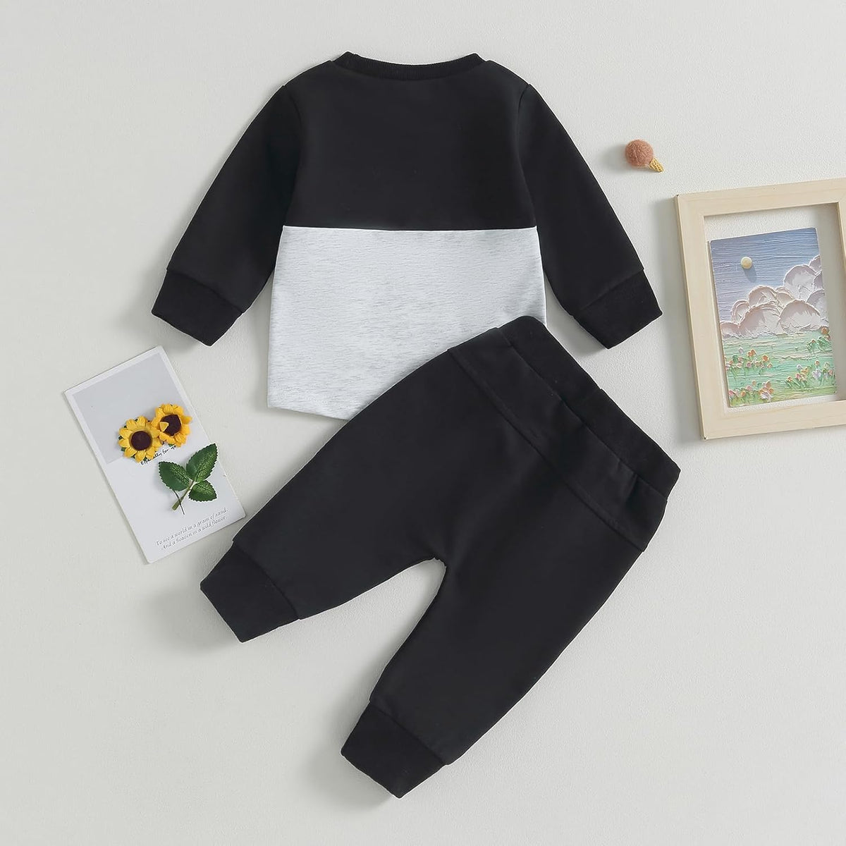 Baby 2-piece outfit: black and gray color-block sweatshirt with matching stretch pants