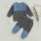 Baby Jogger 2-piece winter outfit: light blue and dark gray colorblock sweatshirt + sweatpants.